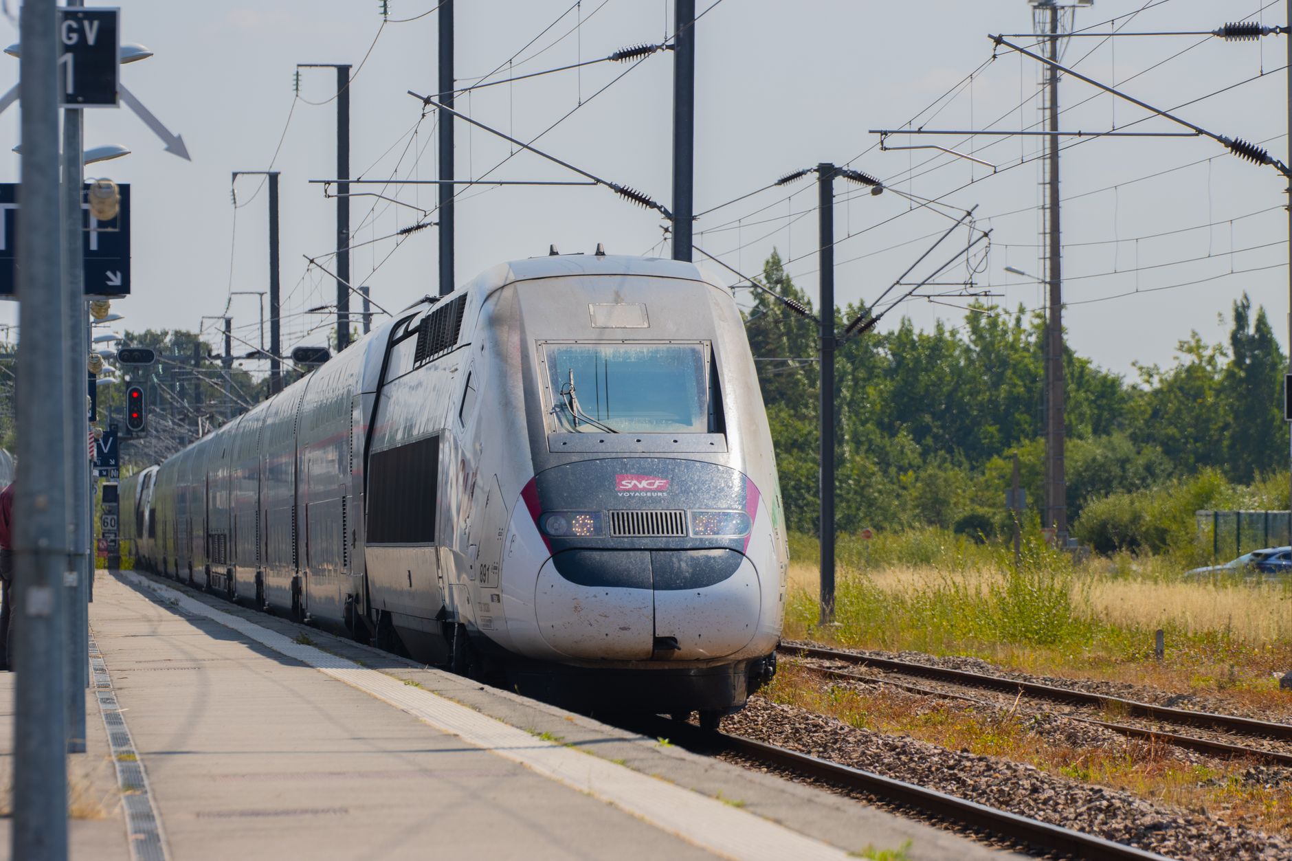 French TGV high speed train traveling through countryside